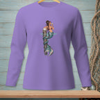 Purple long-sleeve shirt with a mermaid drinking a cocktail on a dock graphic.