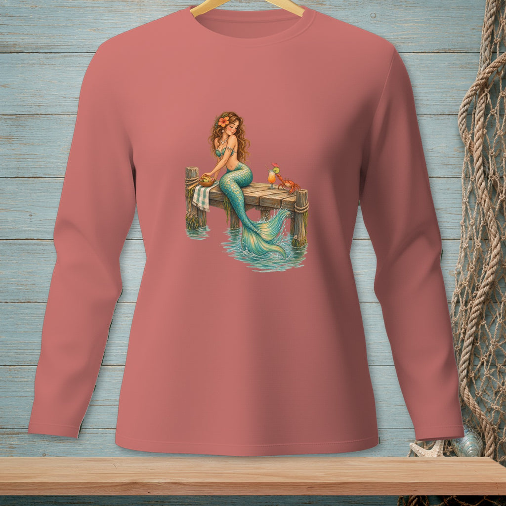 Illustration of a mermaid on a pier with a crab and drinks.