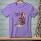 Purple t-shirt with mermaid and crab graphic, reads "Talk to the Tail".