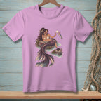 Pink t-shirt featuring a mermaid holding shells and a fish.