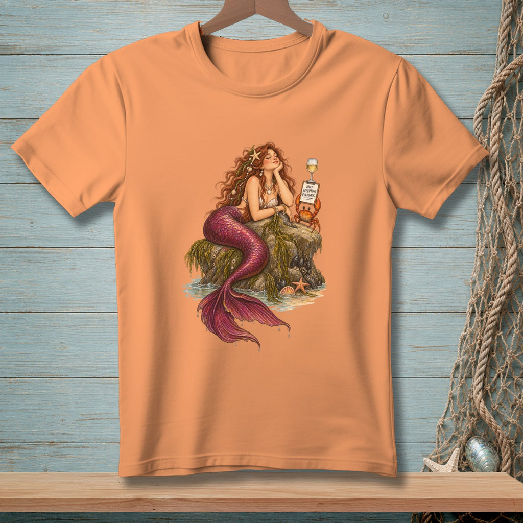 Mermaid relaxing on a rock with a crab holding a sign saying "Not accepting feedback."