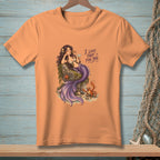 Orange t-shirt with a mermaid and crab graphic and the text "I Love That For You."