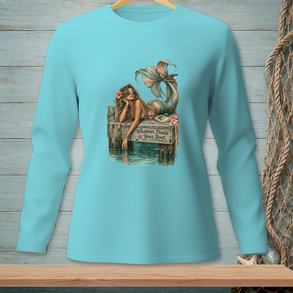 Mermaid relaxing on dock with text "Whatever Floats Your Boat."