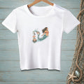 White t-shirt with mermaid and seagull on a buoy with "NO WAKE" text.