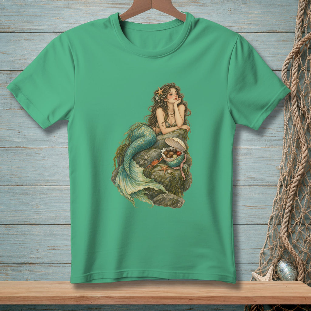 Mermaid with starfish in hair rests on rocks with treasures.
