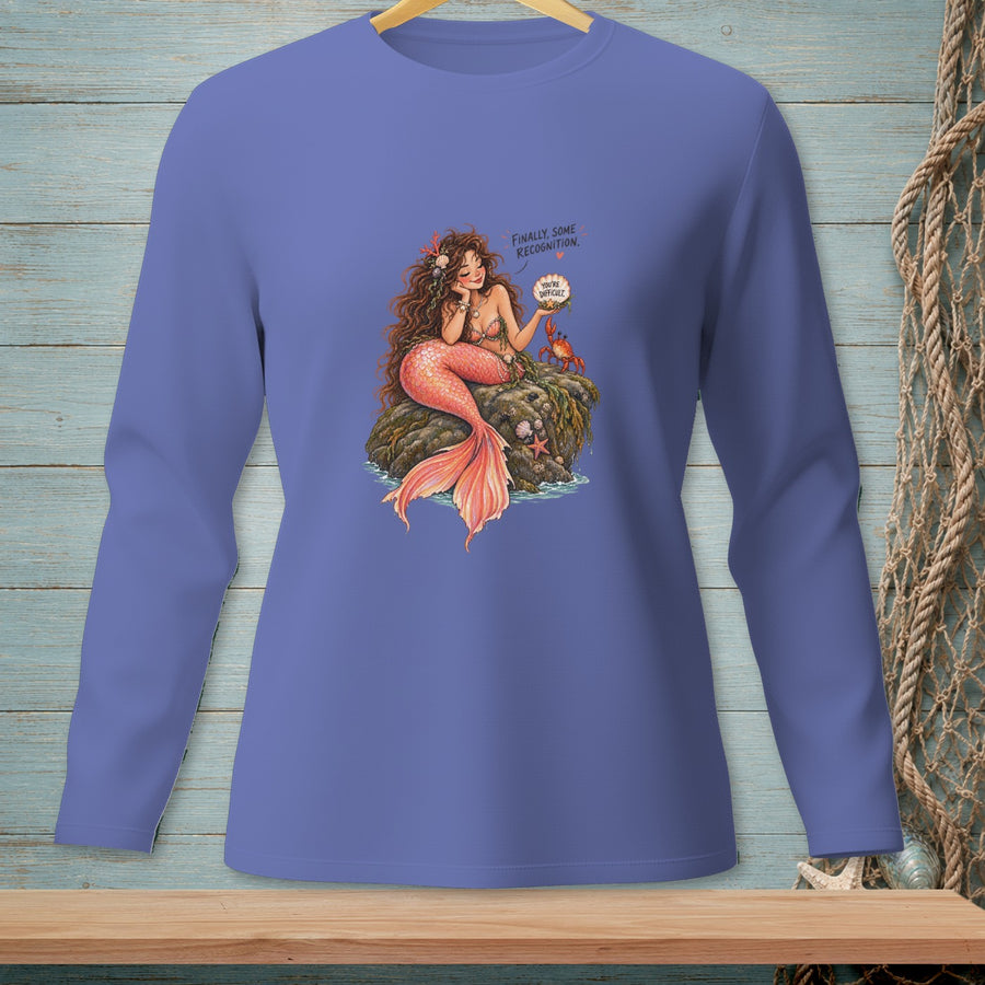 Mermaid with orange tail on rock, talking to crab, "You're difficult."