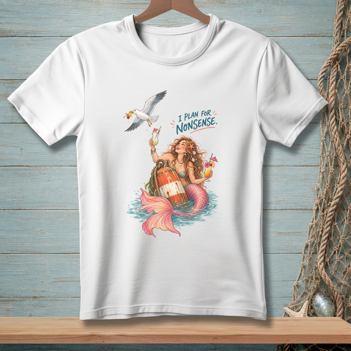Mermaid with cocktails and buoy, text "I PLAN FOR NONSENSE", seagull flying.