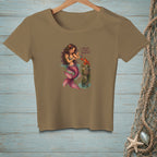 Brown t-shirt with a mermaid giving a gift to a lobster. Text reads "I believe in your potential."
