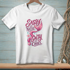 White t-shirt with a pink mermaid and "Sassy by Nature Salty by Choice" text.