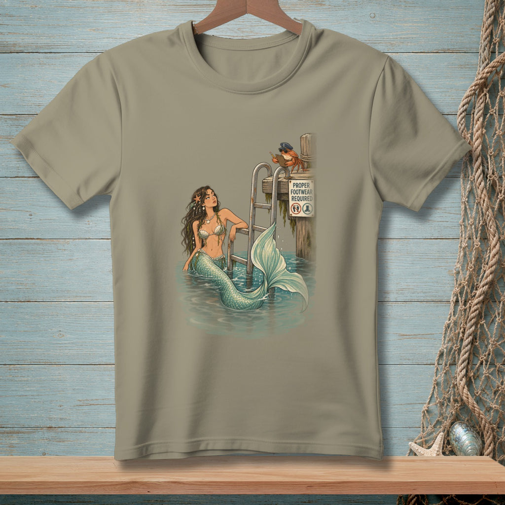 Mermaid in water near ladder with crab wearing sailor hat and sign.