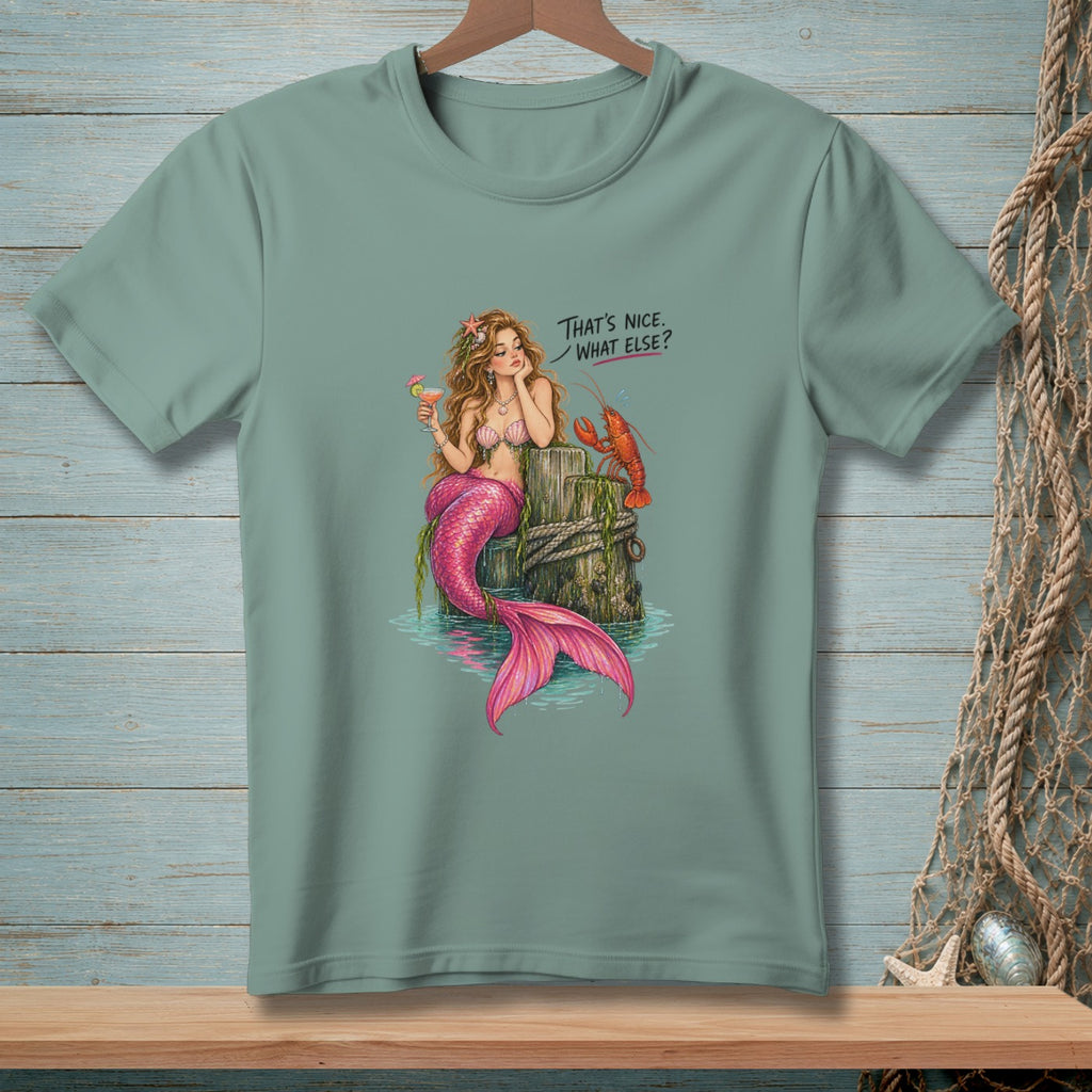 Mermaid with lobster and drink, with text "That's Nice. What Else?"