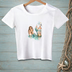 White t-shirt with watercolor mermaid, buoy, and seagull graphic.