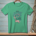 Green t-shirt with "Too Salty To Care" text and a mermaid tail design.