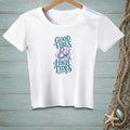 White t-shirt with "Good Vibes & High Tides" text and mermaid tail graphic.