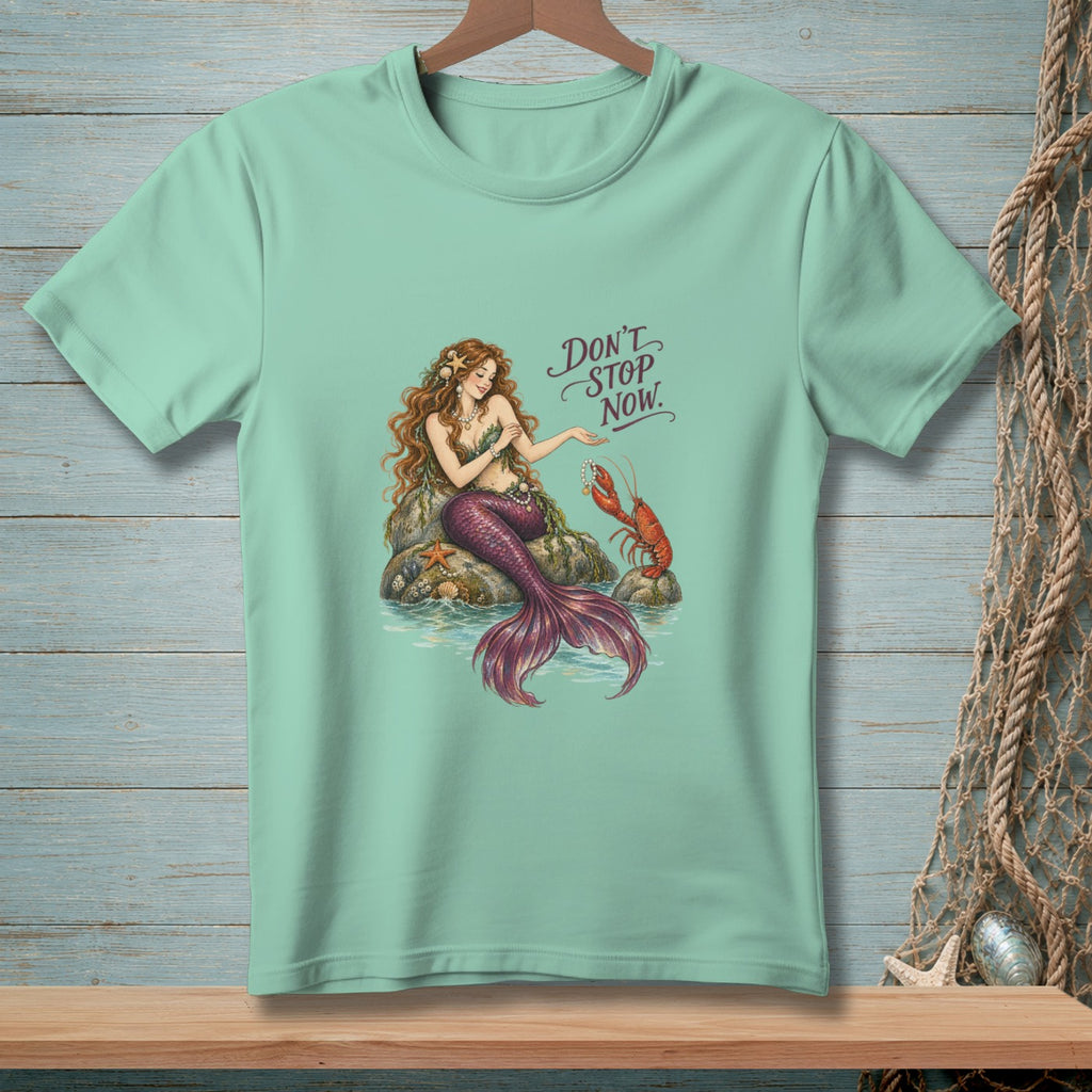 Mermaid sitting on rock with lobster, text "DON'T STOP NOW."