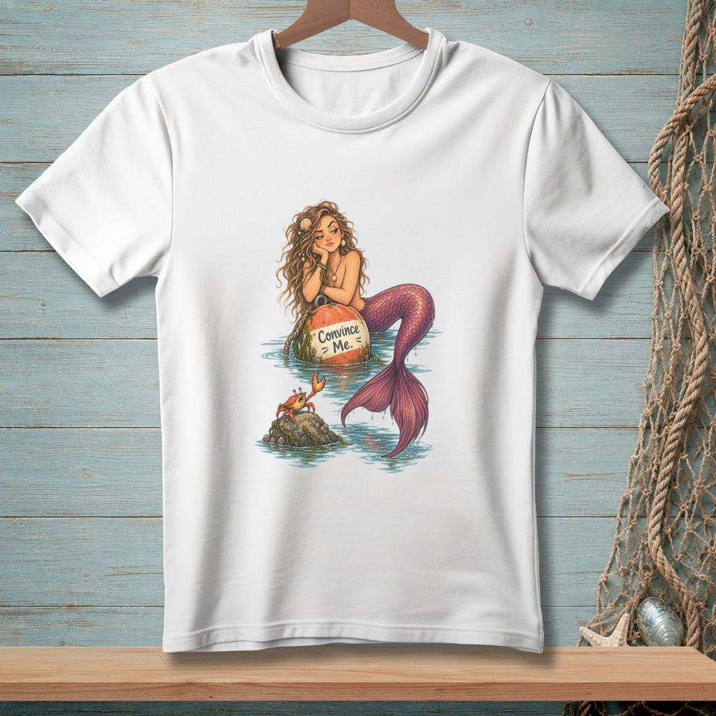 Mermaid on a buoy with text "Convince Me." and a crab on a rock.