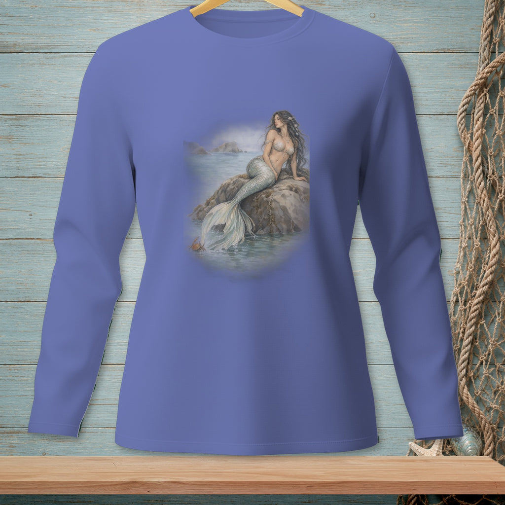 Long-sleeve shirt with a mermaid sitting on a rock by the sea.