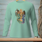 Three mermaids with colorful tails gather around a table with drinks.