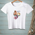 White t-shirt with a mermaid and pufferfish graphic and text.