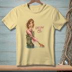 Light yellow t-shirt with mermaid and crab illustration and "UNCLAW ME." text.