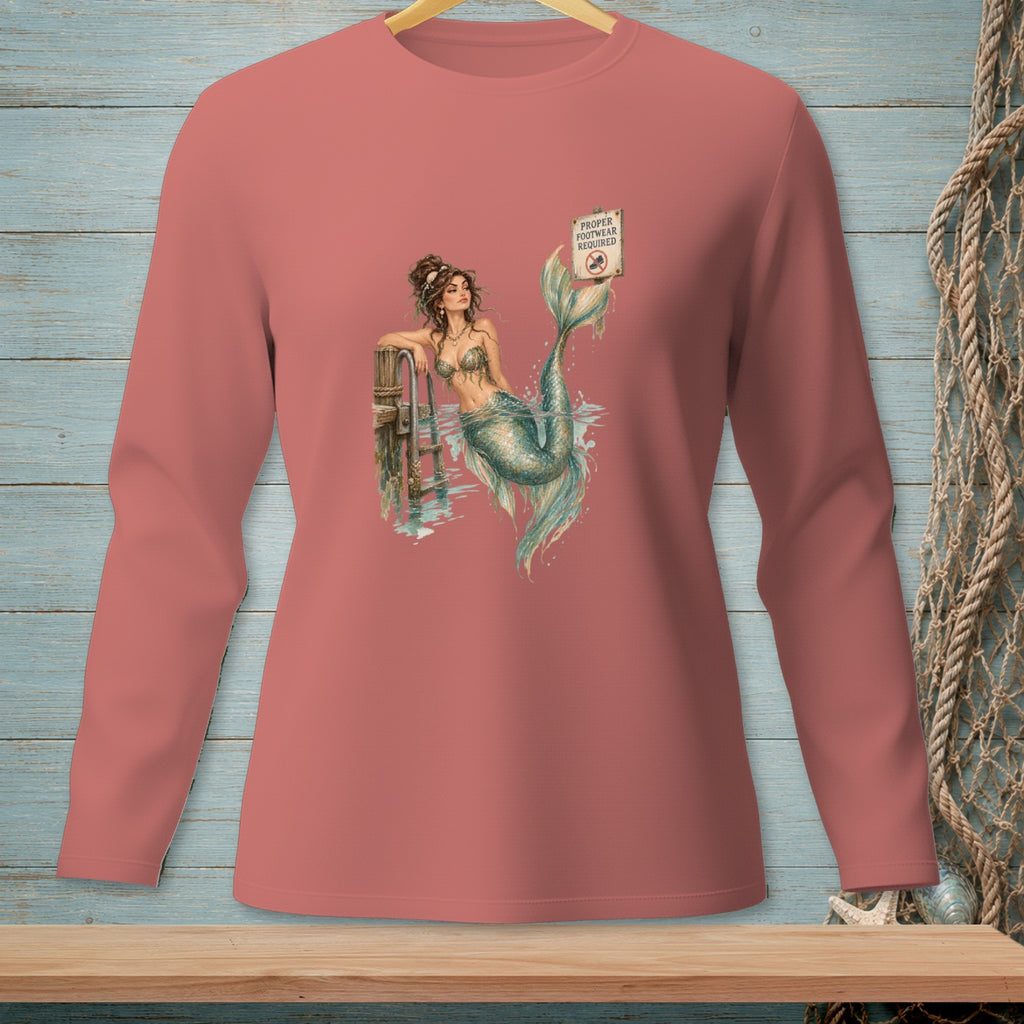 Long-sleeve shirt with a mermaid on a dock and a "Proper Footwear Required" sign.