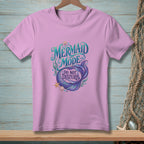 Lavender t-shirt with mermaid, seashells, and "Mermaid Mode: Do Not Disturb" text.