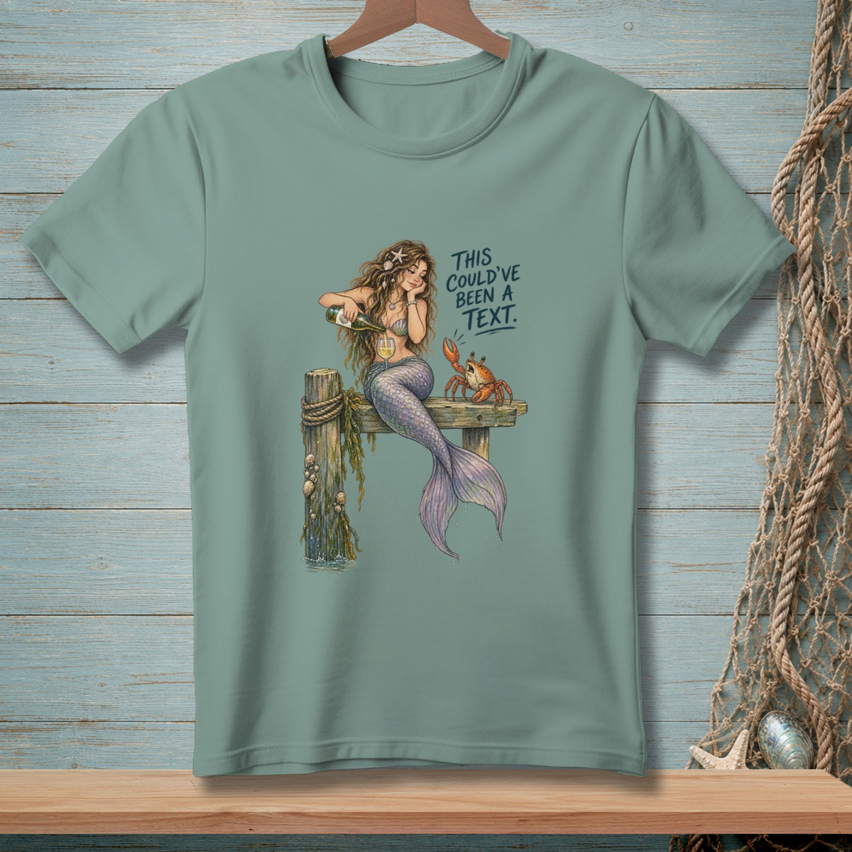 Mermaid and crab on a dock with text "THIS COULD'VE BEEN A TEXT."
