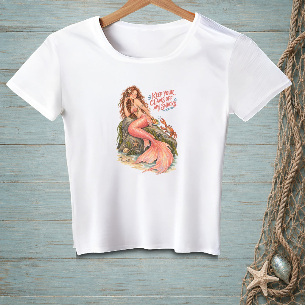 White t-shirt with a mermaid and crab graphic that reads "Keep Your Claws Off My Snacks."