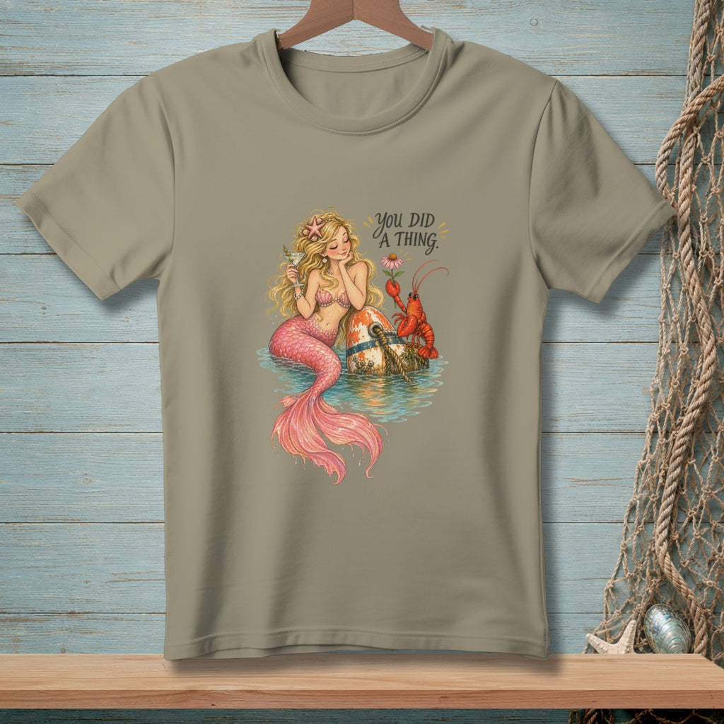 Mermaid with lobster and text "You Did a Thing" on a t-shirt.