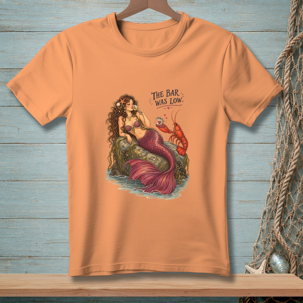 Mermaid with lobster and drink, text "THE BAR WAS LOW"