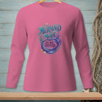 Pink long-sleeved shirt with "Mermaid Mode: Do Not Disturb" and mermaid tail graphic.