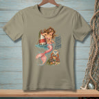 A mermaid by a buoy with a crab holding a "Pinch Me" sign.