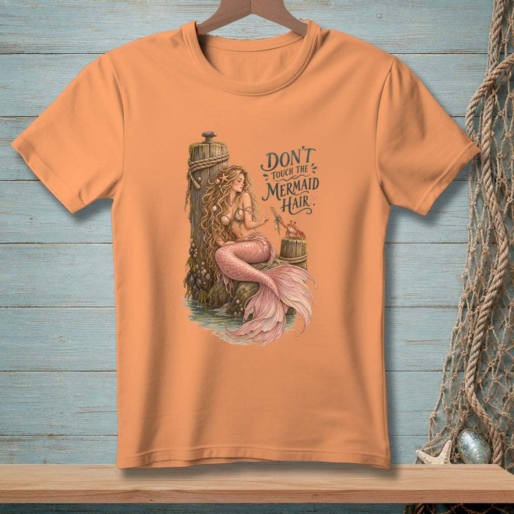 Peach t-shirt with a mermaid illustration and "Don't Touch the Mermaid Hair" text.