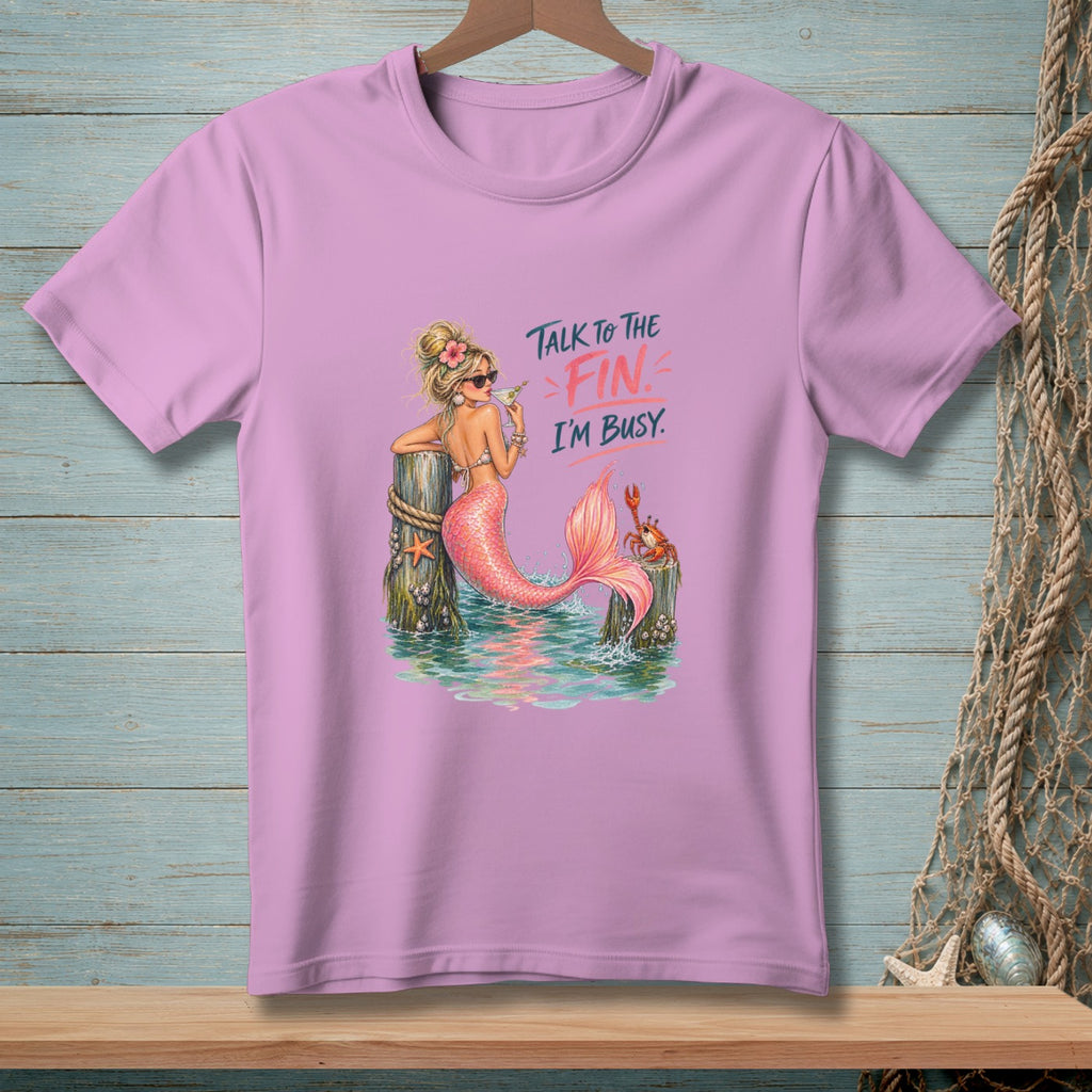 Pink t-shirt with a mermaid graphic and text that reads "Talk to the Fin. I'm Busy."