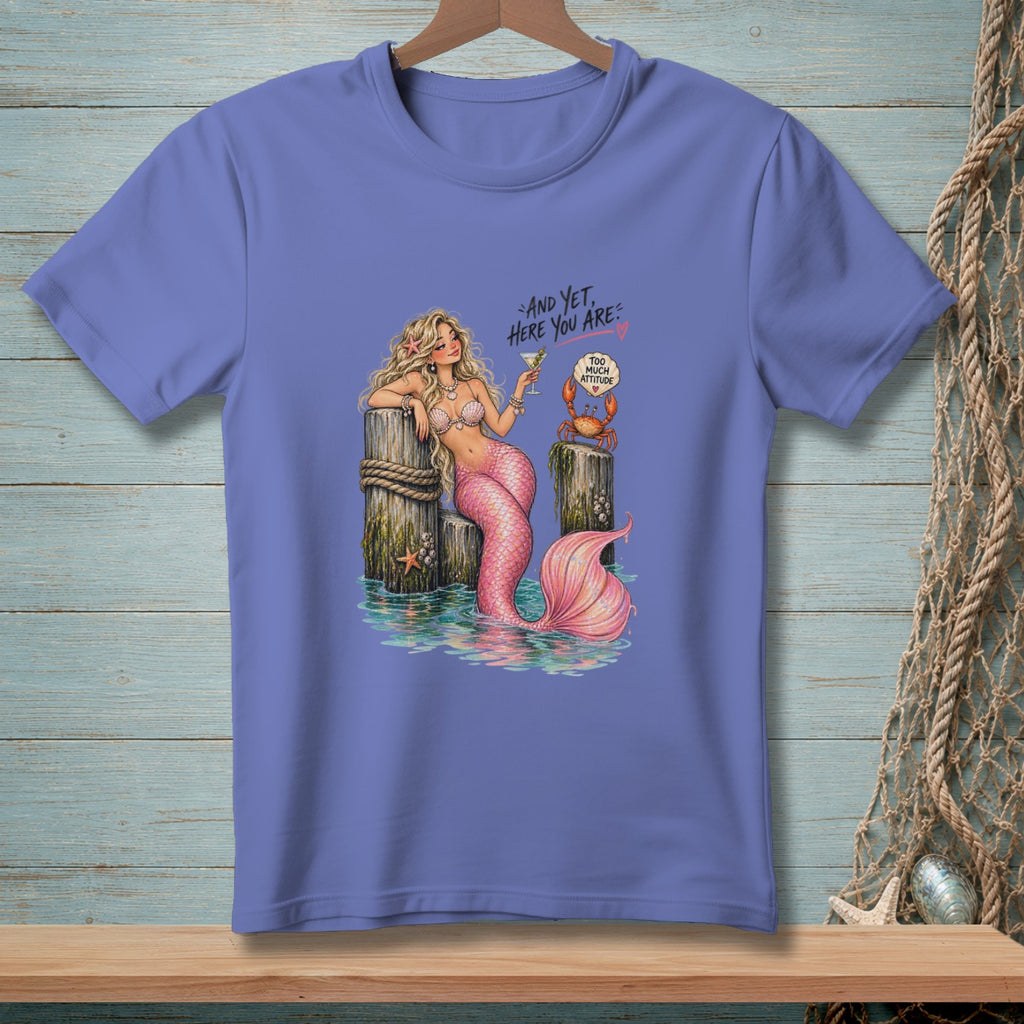 Mermaid with pink tail and cocktail by pilings, with crab and text.