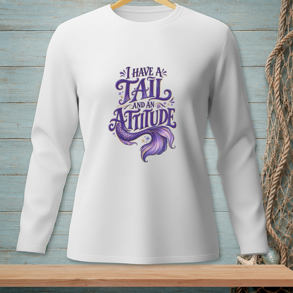 White long-sleeve shirt with purple text and mermaid tail: "I HAVE A TAIL AND AN ATTITUDE".