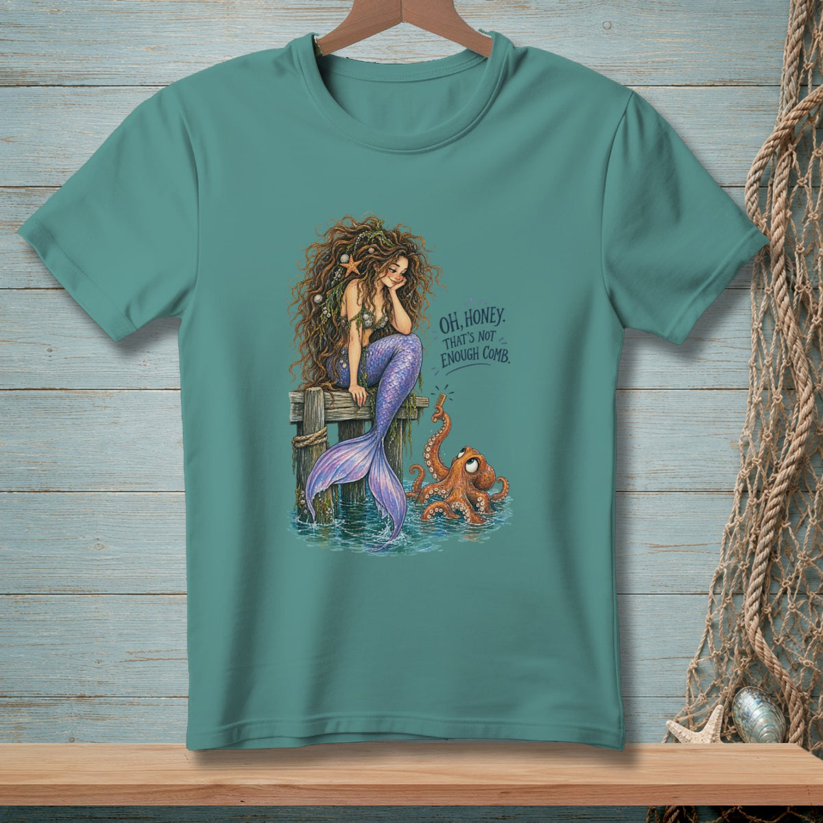 Mermaid sitting on dock with octopus and text "Oh, honey. That's not enough comb."