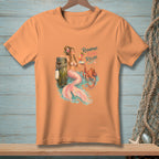 Peach t-shirt with mermaid, octopus, and text "Repurpose. Reuse. Relax."