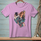 Pink t-shirt with mermaid leaning on a post next to a boat and bottle.