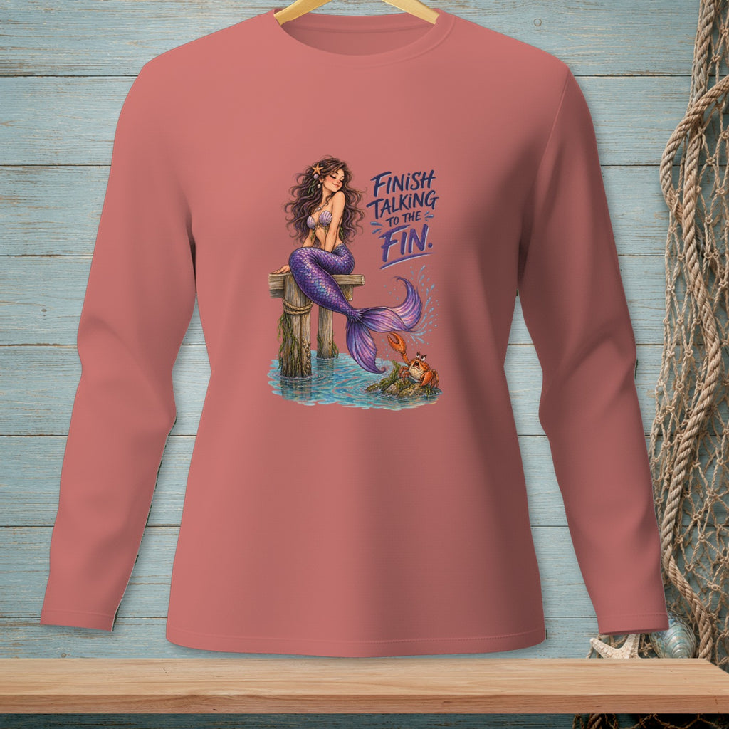 Mermaid with purple tail on dock with crab, text "Finish Talking to the Fin."