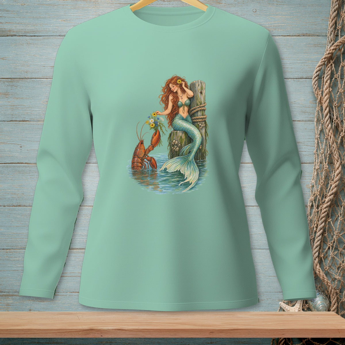Mermaid holding flowers with lobster on a wooden post in water.