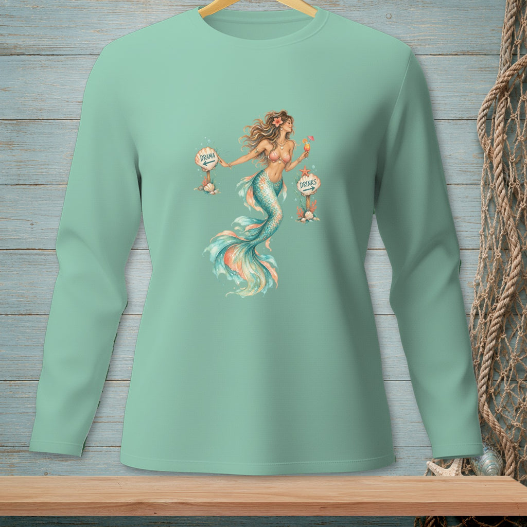 Mint green long sleeve shirt with a mermaid holding a drink and pointing to signs.