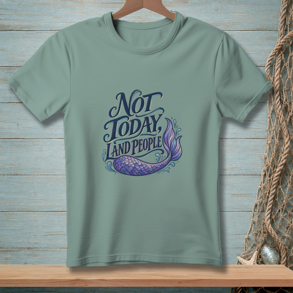 Teal t-shirt with "Not Today, Land People" and a mermaid tail graphic.