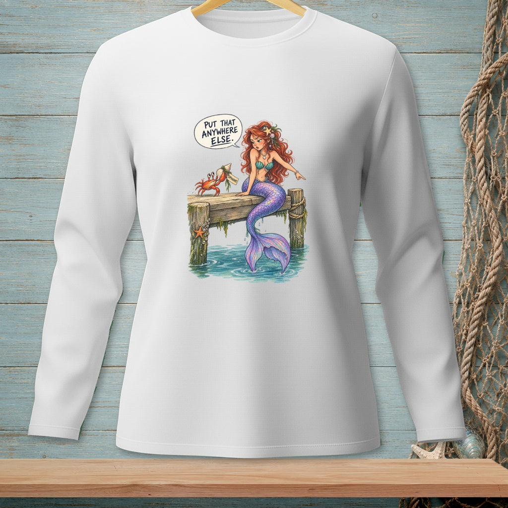 Mermaid on dock with crab, saying "Put that anywhere else."