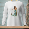 White long-sleeve shirt with a detailed illustration of a mermaid holding a drink by a wooden post.