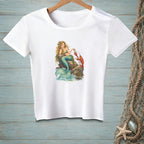 White t-shirt with a graphic of a mermaid and lobster by the sea.