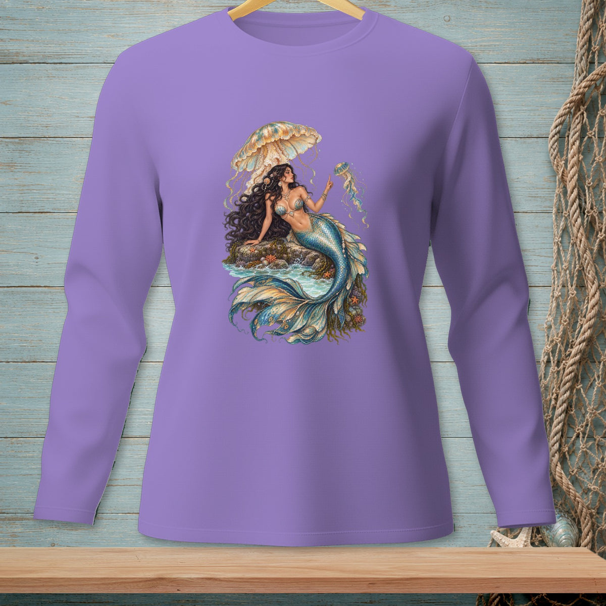 Long-sleeve shirt with a detailed mermaid graphic sitting under a jellyfish.