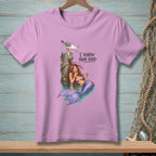 Pink t-shirt with mermaid and seagull graphic saying "I KNOW YOUR KIND."