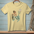 T-shirt with a mermaid illustration and a "Proper Footwear Required" sign.