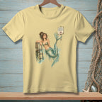 T-shirt with a mermaid illustration and a "Proper Footwear Required" sign.
